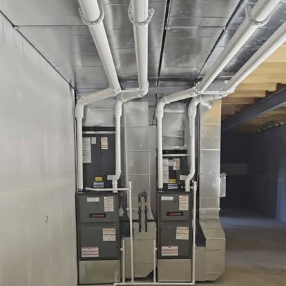 Paired furnace equipment with overhead connections, from Williams Heating & Cooling