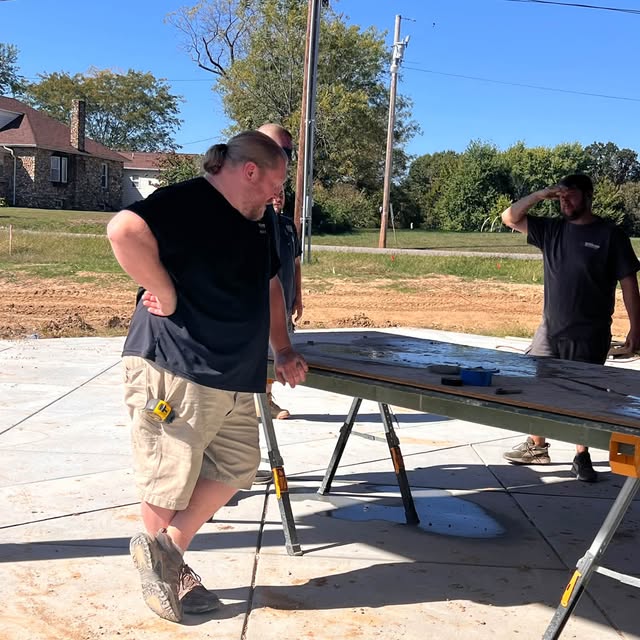 People preparing material outdoors, from Williams Heating & Cooling